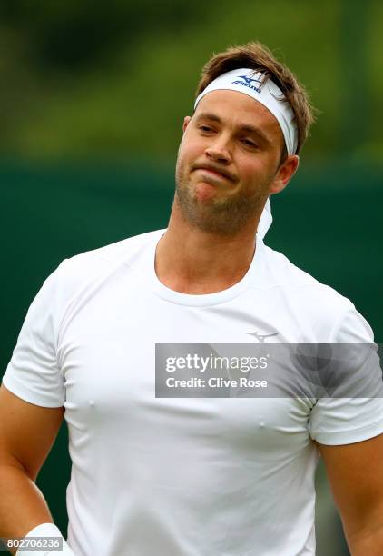 Marcus Willis of Great Britain reacts during his singles qualifying match against Liam Broady of Great Britain during the 2017 Wimbledon qualifying...