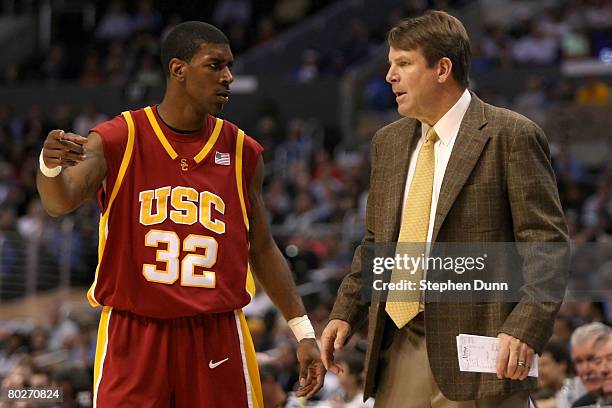 Head coach Tim Floyd of the USC Trojans directs O.J. Mayo on the sidelines during the semifinals of the 2008 Pacific Life Pac-10 Men's Basketball...