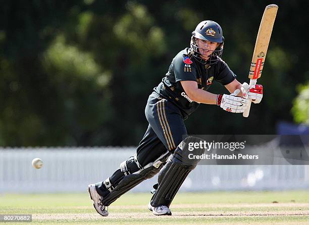 Ellyse Perry of Australia drives during the fourth Rose Bowl Series One Day International match between the New Zealand Silver Ferns and Australian...