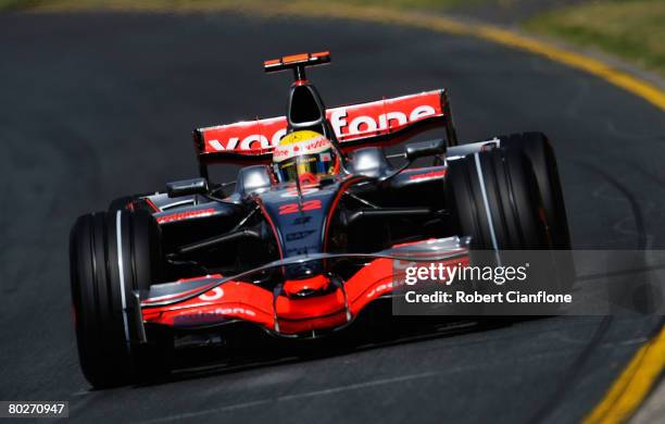 Lewis Hamilton of Great Britain and McLaren Mercedes on his way to pole position in qualifying for the Australian Formula One Grand Prix at the...