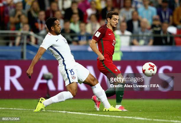 Jean Beausejour of Chile and Cedric of Portugal battle for possession during the FIFA Confederations Cup Russia 2017 Semi-Final between Portugal and...