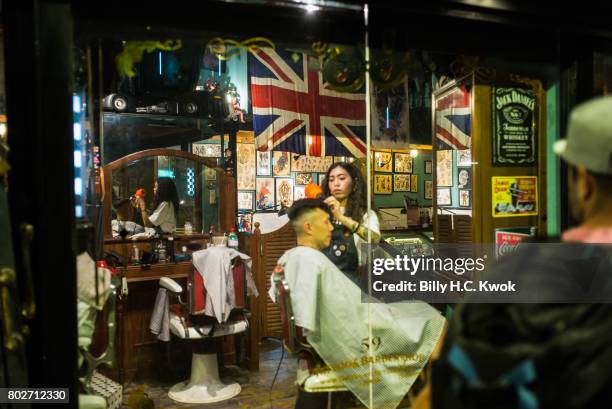 Man having a hair cut in the salon on June 24, 2017 in Hong Kong, Hong Kong. Hong Kong is marking 20 years since the territory was handed from...