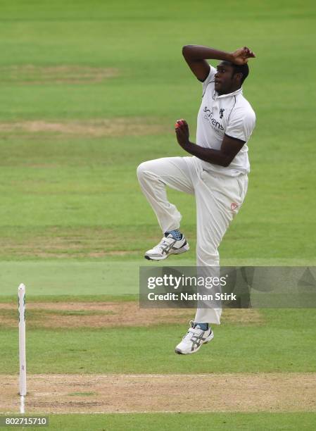 Keith Barker of Warwickshire runs into bowl during the Specsavers County Championship Division One match between Warwickshire and Lancashire at...