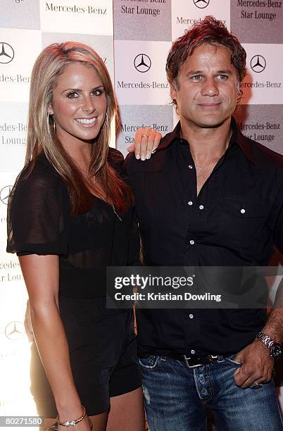 Model Candice Falzon and singer Jon Stevens attend the Mecedes Benz Star Lounge following the Australian Formula One Grand Prix at Eureka Tower sky...