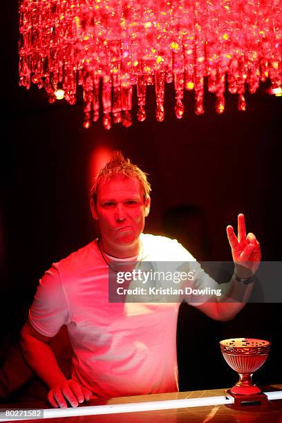 Shane Warne poses at the Mecedes Benz Star Lounge following the Australian Formula One Grand Prix at Eureka Tower sky deck on March 16, 2008 in...