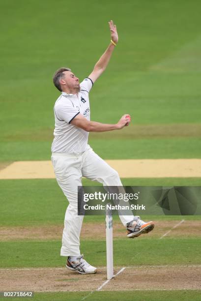 Rikki Clarke of Warwickshire runs into bowl during the Specsavers County Championship Division One match between Warwickshire and Lancashire at...