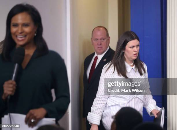 Deputy Press Secretary Sarah Huckabee Sanders walks into the briefing room to give an off-camera daily briefing at the James Brady Press Briefing...