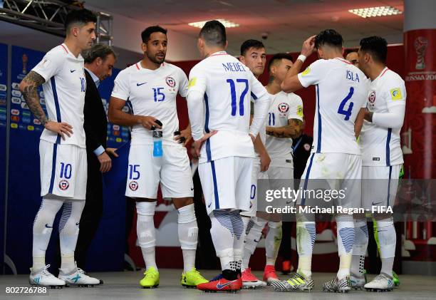 Jean Beausejour of Chile and Gary Medel of Chile speak in the tunnel at half time during the FIFA Confederations Cup Russia 2017 Semi-Final between...