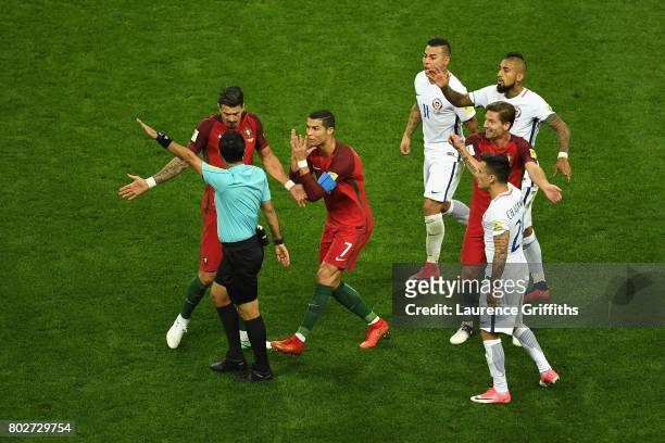 Jose Fonte of Portugal and Cristiano Ronaldo of Portugal argues with Referee Alireza Faghani during the FIFA Confederations Cup Russia 2017...