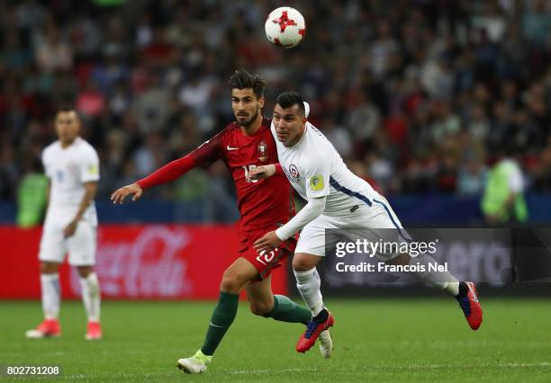 Andre Gomes of Portugal and Gary Medel of Chile battle for possession during the FIFA Confederations Cup Russia 2017 Semi-Final between Portugal and...