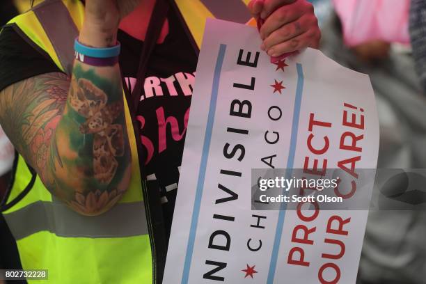 Demonstrators protest changes to the Affordable Care Act on June 28, 2017 in Chicago, Illinois. After more senators said they would not offer...