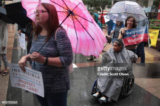 Demonstrators protest changes to the Affordable Care Act on June 28, 2017 in Chicago, Illinois. After more senators said they would not offer...