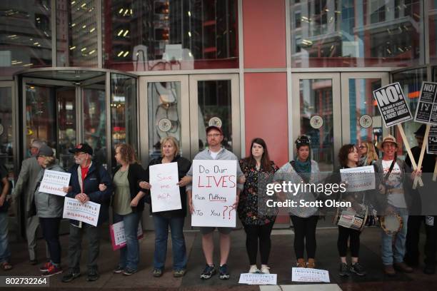 Demonstrators protest changes to the Affordable Care Act on June 28, 2017 in Chicago, Illinois. After more senators said they would not offer...