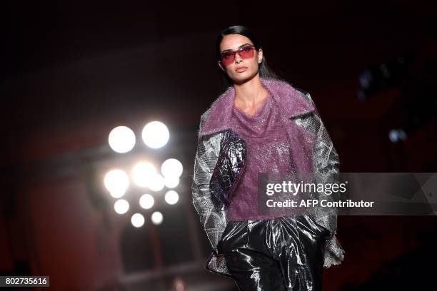 Model presents a creation by Custo Barcelona during the 080 Barcelona Fashion Week, at Sant Pau hospital, in Barcelona on June 28, 2017. / AFP PHOTO...