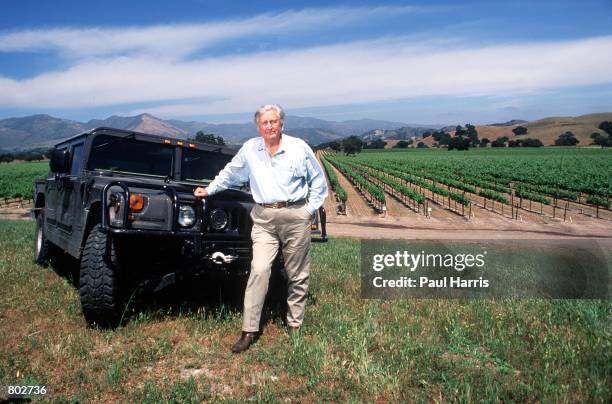 Actor Fess Parker who starred in Disney's "Davy Crockett" series in the 1950's stands by his hummer near his home May 25, 2000 in Los Olivos, CA.