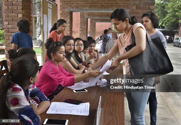 The volunteers helping the new students and parents in the admission process for the new academic session 2017-18, at Miranda House in North Campus...