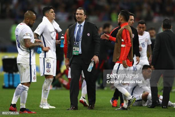 Juan Antonio Pizzi of Chile speaks to his players prior to extra time during the FIFA Confederations Cup Russia 2017 Semi-Final between Portugal and...