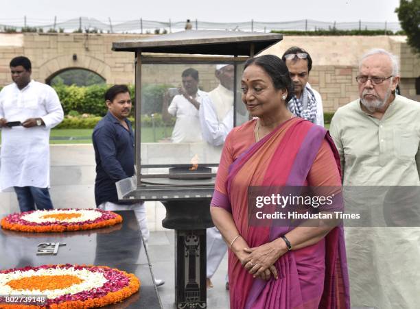 Meira Kumar, UPA candidate for the President of India, paying floral tributes to Father of the Nation Mahatma Gandhi at Rajghat before filing her...