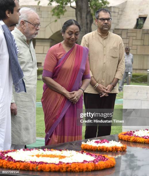 Meira Kumar, UPA candidate for the President of India, paying floral tributes to Father of the Nation Mahatma Gandhi at Rajghat before filing her...