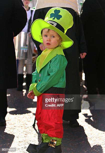 Young boy dressed in costume attends St Patrick's day celebrations in Belfast, Northern Ireland, on March 17, 2008. Hundreds of thousands of...