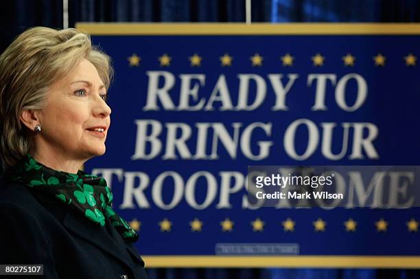 Democratic presidential hopeful Sen. Hillary Clinton listens to her introduction before delivering a speech on Iraq at George Washington University,...