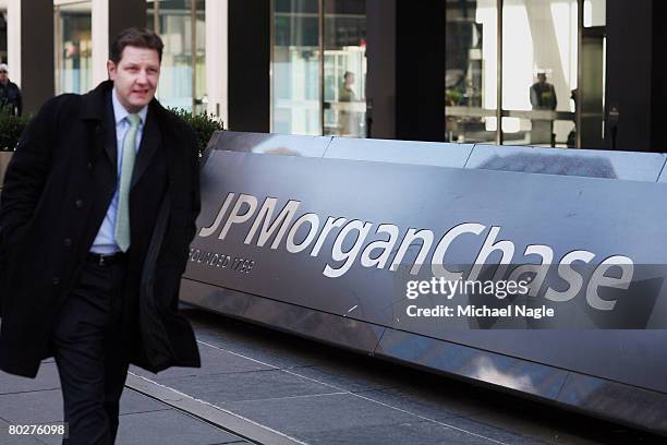 Man walks past the offices of JP Morgan Chase on March 17, 2008 in New York City. JP Morgan Chase bought Bear, Stearns & Co, for $2 a share, with...