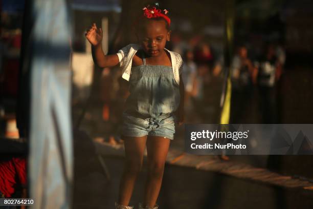 Palestinian children play in a park on the fourth day of Eid al-Fitr, which marks the end of the holy month of Ramadan. Eid al - Fitr holiday...