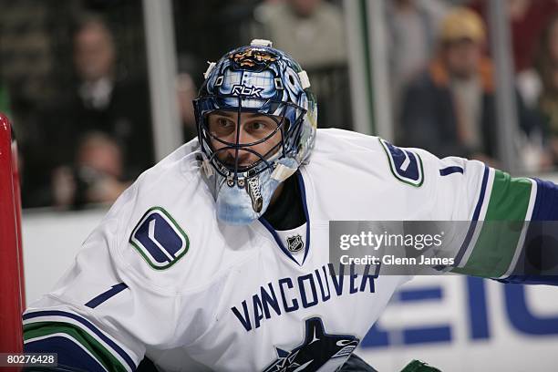 Roberto Luongo of the Vancouver Canucks tends goal against the Dallas Stars at the American Airlines Center on March 15, 2008 in Dallas, Texas.