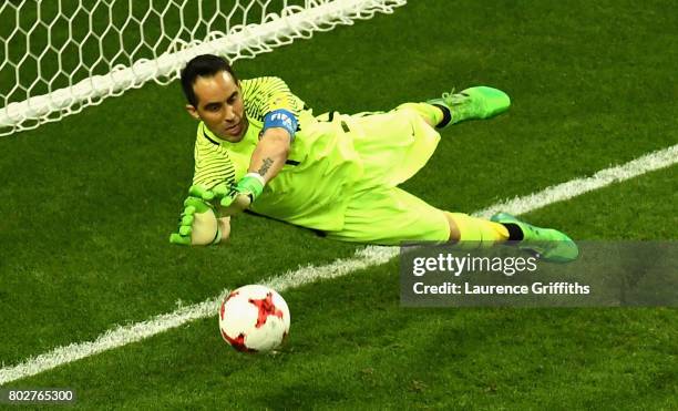 Claudio Bravo of Chile saves Portugal second penatly during the penalty shoot out during the FIFA Confederations Cup Russia 2017 Semi-Final between...