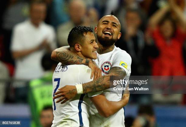 Alexis Sanchez of Chile celebrates scoring his sides third penalty with Arturo Vidal of Chile during the FIFA Confederations Cup Russia 2017...
