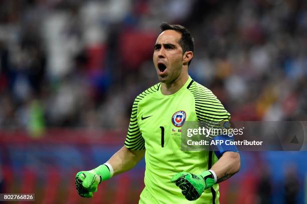 Chile's goalkeeper Claudio Bravo reacts as Chile goes into the finals of the 2017 Confederations Cup semi-final football match after beating Portugal...