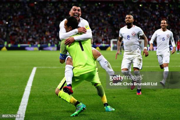 Claudio Bravo of Chile celebrates with his team mates after the penalty shoot out during the FIFA Confederations Cup Russia 2017 Semi-Final between...