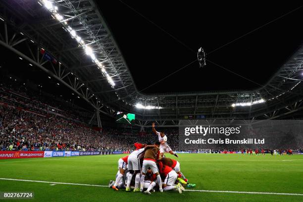 Claudio Bravo of Chile is mobbed by his team mates as they celebrate after the penalty shootout during the FIFA Confederations Cup Russia 2017...