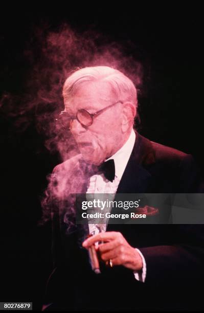 Entertainer and comedian, George Burns, performs at a 1986 Beverly Hills, California benefit held at the Beverly Hilton Hotel. A star of vaudeville,...