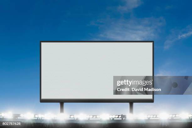 jumbotron large scale screen in sports stadium - replay fotografías e imágenes de stock