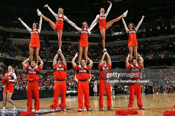 Cheerleaders from the Illinois Fighting Illini perform against the Minnesota Golden Gophers during their semifinal game on Day 3 of the Big Ten Men's...