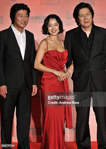 Actor Song Kang-ho, actress Jeon Do-yeon and director Lee Chang-dong arrive at the Asian Film Awards 2008 in Hong Kong, China