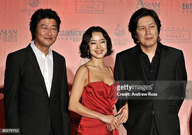 Actor Song Kang-ho, actress Jeon Do-yeon and director Lee Chang-dong arrive at the Asian Film Awards 2008 in Hong Kong, China