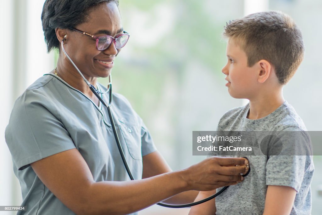 Using The Stethoscope Using A Stethoscope High-Res Stock Photo - Getty Images