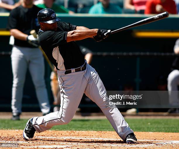 Outfielder Vernon Wells of the Toronto Blue Jays fouls off a pitch against the Pittsburgh Pirates during the Grapefruit League Spring Training game...