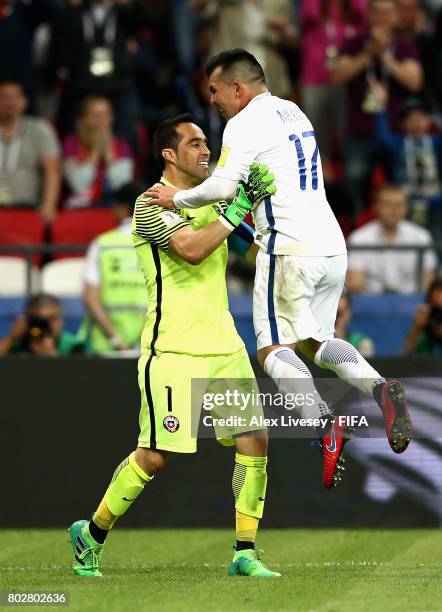 Claudio Bravo of Chile celebrates winning the penalty shoot out with Gary Medel of Chile after the FIFA Confederations Cup Russia 2017 Semi-Final...
