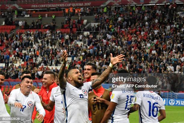 Chile's midfielder Arturo Vidal celebrates after Chile won the 2017 Confederations Cup semi-final football match in a penalty shoot out against...