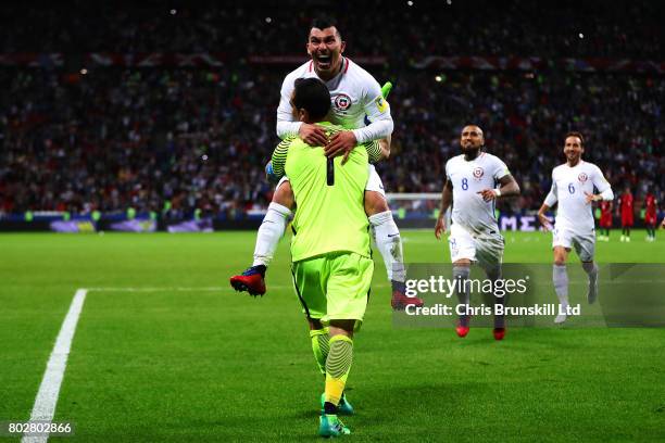 Claudio Bravo of Chile is congratulated by team-mate Gary Medel after the penalty shoot out following the FIFA Confederations Cup Russia 2017...