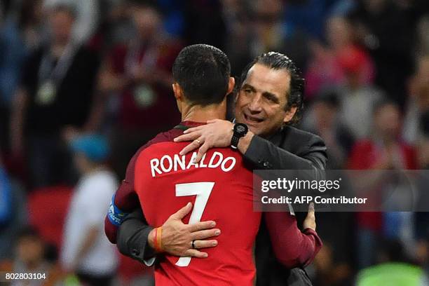 Portugal's forward Cristiano Ronaldo congratulates Chile's Spanish coach Juan Antonio Pizzi (R0 after the 2017 Confederations Cup semi-final football...