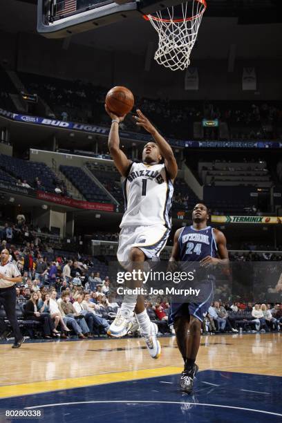 Kyle Lowry of the Memphis Grizzlies goes up for the shot during the NBA game against the Utah Jazz at the FedExForum on February 2, 2008 in Memphis,...