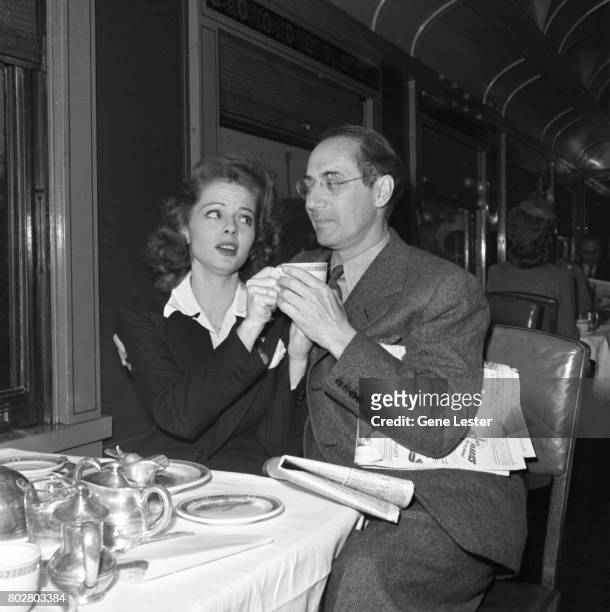 Actors Arlene Whelan and Groucho Marx on the train of the Hollywood Victory Caravan which was a group of stars who toured 13 US cities to raise funds...