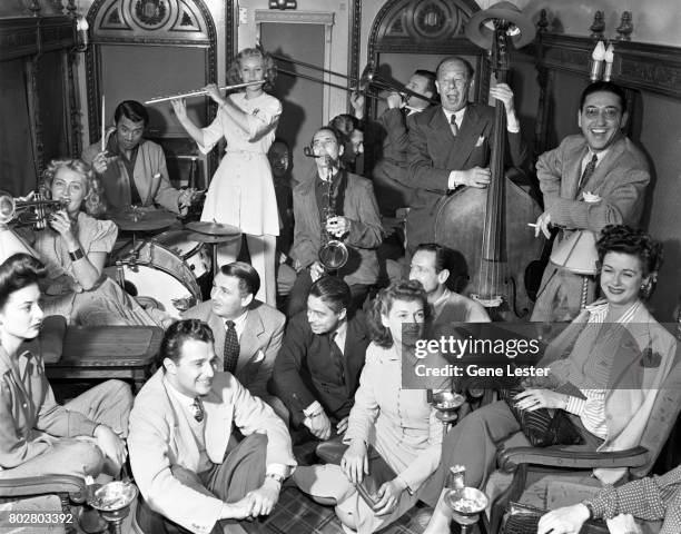 Joan Blondell;Cary Grant;Marie McDonald;Groucho Marx;Bert Lahr;Rise Stevens;Joan Bennett performing at the LA train station aka Union Station as part...