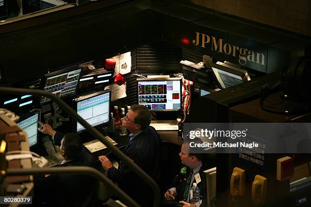 Traders work the floor of the New York Stock Exchange on March 17, 2008 in New York City. Stocks have been volatile on Wall Street following news of...