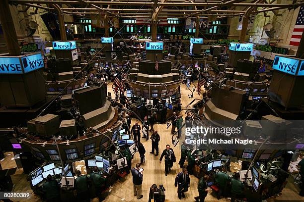 Traders work the floor of the New York Stock Exchange on March 17, 2008 in New York City. Stocks have been volatile on Wall Street following news of...