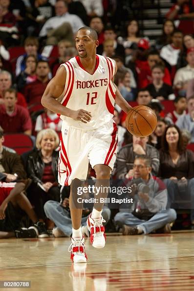 Rafer Alston of the Houston Rockets brings the ball upcourt during ...